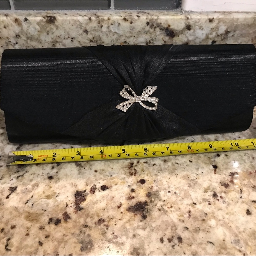 Black evening clutch/rhinestone bow embellishment
